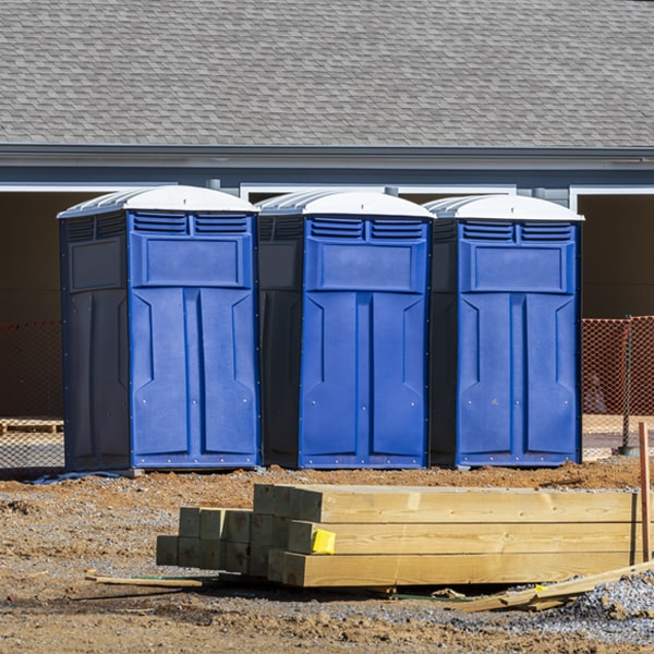 what is the cost difference between standard and deluxe portable toilet rentals in Hope Valley RI